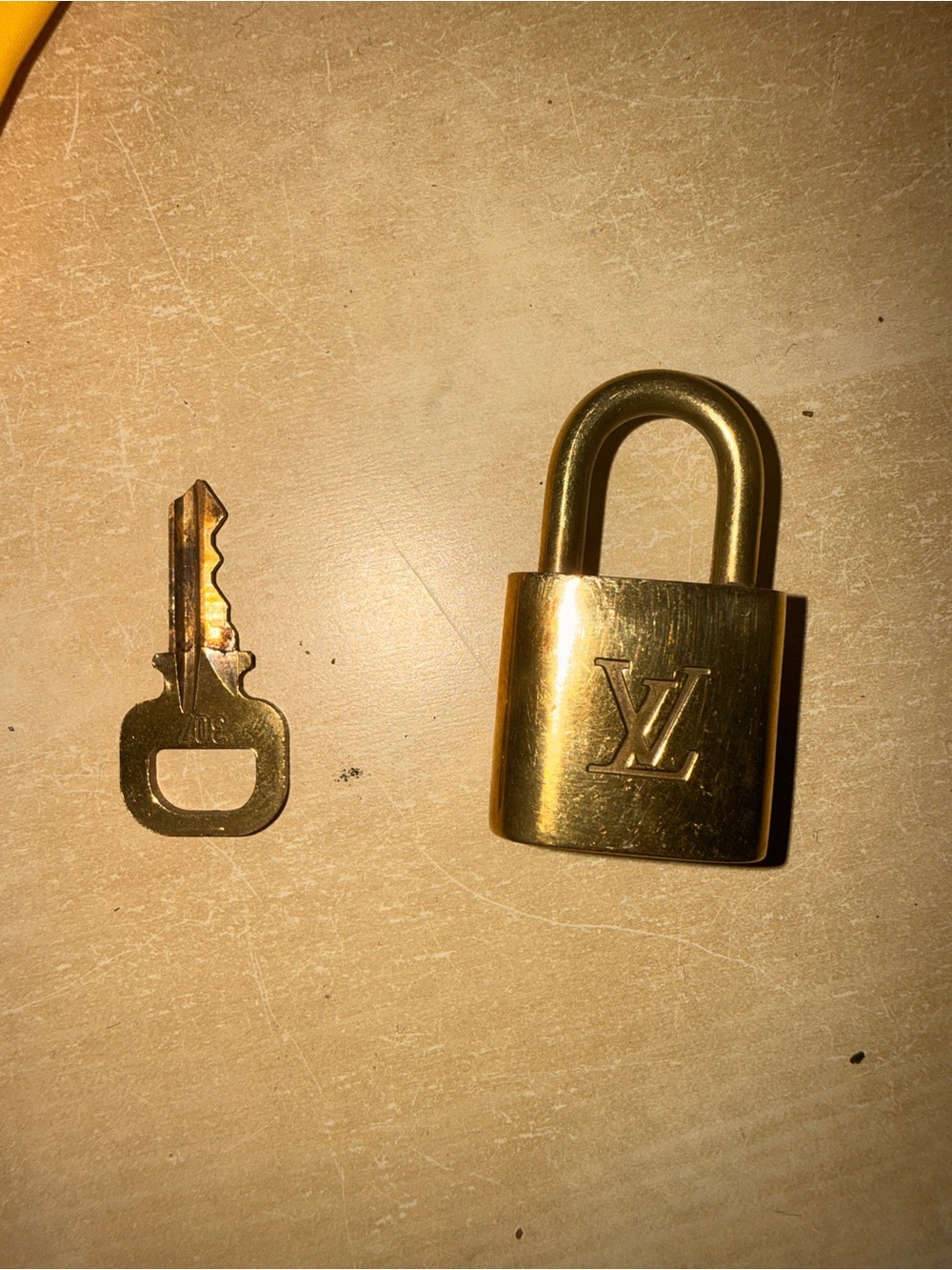 Louis Vuitton Gold Padlock and Matching Key 307